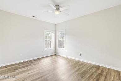 Step into this beautifully renovated home in the highly on Magnolia Greens Golf Plantation in North Carolina - for sale on GolfHomes.com, golf home, golf lot