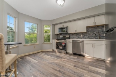 Step into luxury with this beautifully renovated multi-floor on Fairway Valley Golf Club in New Jersey - for sale on GolfHomes.com, golf home, golf lot