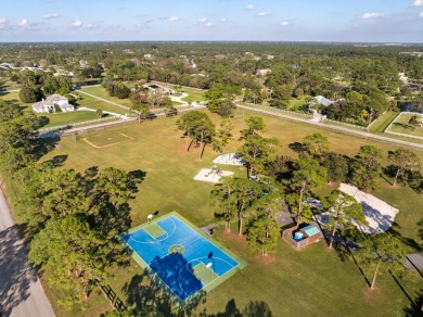 Discover the perfect blend of luxury and country living at 501 on The Cape Club of Palm City in Florida - for sale on GolfHomes.com, golf home, golf lot