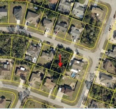 Surrounded by an established residential setting, this 0.23-acre on Oak Hills Country Club in Florida - for sale on GolfHomes.com, golf home, golf lot