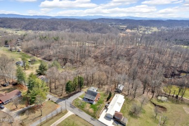 This 4 bed, 2 bath residence boasts a host of features that make on Crocketts Ridge Golf Club in Tennessee - for sale on GolfHomes.com, golf home, golf lot