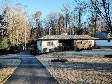 What a location and what a house!***Please see virtual in link on The Walker Golf Course At Clemson University in South Carolina - for sale on GolfHomes.com, golf home, golf lot