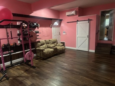 Welcome to this spacious and inviting 4-bedroom, 2.5-bath home on Paintsville Country Club in Kentucky - for sale on GolfHomes.com, golf home, golf lot