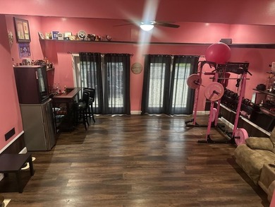 Welcome to this spacious and inviting 4-bedroom, 2.5-bath home on Paintsville Country Club in Kentucky - for sale on GolfHomes.com, golf home, golf lot