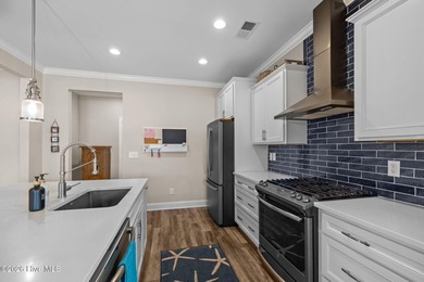 This home combines stunning views, thoughtful upgrades, and an on North River Club in North Carolina - for sale on GolfHomes.com, golf home, golf lot