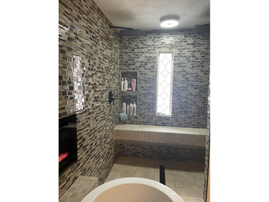 Welcome to this spacious and inviting 4-bedroom, 2.5-bath home on Paintsville Country Club in Kentucky - for sale on GolfHomes.com, golf home, golf lot