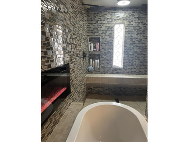 Welcome to this spacious and inviting 4-bedroom, 2.5-bath home on Paintsville Country Club in Kentucky - for sale on GolfHomes.com, golf home, golf lot