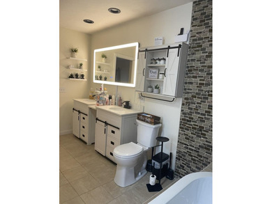 Welcome to this spacious and inviting 4-bedroom, 2.5-bath home on Paintsville Country Club in Kentucky - for sale on GolfHomes.com, golf home, golf lot