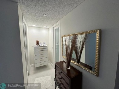Stunningly remodeled 2/2 condo located in The Oaks at Palm Aire on Palm-Aire Country Club and Resort - The Oaks in Florida - for sale on GolfHomes.com, golf home, golf lot