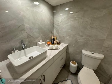 Stunningly remodeled 2/2 condo located in The Oaks at Palm Aire on Palm-Aire Country Club and Resort - The Oaks in Florida - for sale on GolfHomes.com, golf home, golf lot