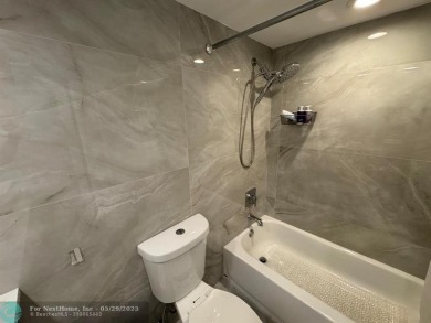 Stunningly remodeled 2/2 condo located in The Oaks at Palm Aire on Palm-Aire Country Club and Resort - The Oaks in Florida - for sale on GolfHomes.com, golf home, golf lot