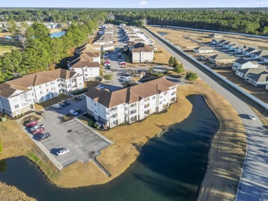 Gorgeous, top floor 2 bedroom unit that's eye catching from top on Palmetto Greens Golf and Country Club in South Carolina - for sale on GolfHomes.com, golf home, golf lot