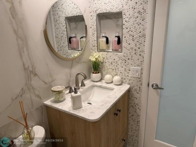 Stunningly remodeled 2/2 condo located in The Oaks at Palm Aire on Palm-Aire Country Club and Resort - The Oaks in Florida - for sale on GolfHomes.com, golf home, golf lot