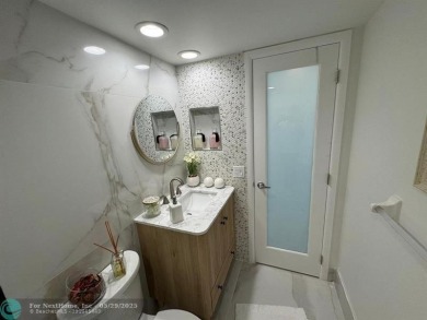Stunningly remodeled 2/2 condo located in The Oaks at Palm Aire on Palm-Aire Country Club and Resort - The Oaks in Florida - for sale on GolfHomes.com, golf home, golf lot
