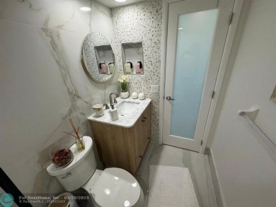 Stunningly remodeled 2/2 condo located in The Oaks at Palm Aire on Palm-Aire Country Club and Resort - The Oaks in Florida - for sale on GolfHomes.com, golf home, golf lot