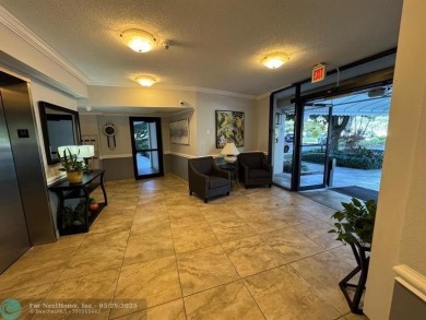 Stunningly remodeled 2/2 condo located in The Oaks at Palm Aire on Palm-Aire Country Club and Resort - The Oaks in Florida - for sale on GolfHomes.com, golf home, golf lot