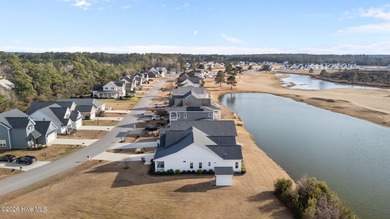 This home combines stunning views, thoughtful upgrades, and an on North River Club in North Carolina - for sale on GolfHomes.com, golf home, golf lot