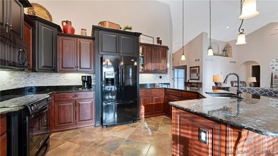 Flat driveway, Flat yard, Vaulted Ceilings and Main Level Living on Osage National Golf Club in Missouri - for sale on GolfHomes.com, golf home, golf lot