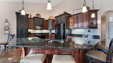 Flat driveway, Flat yard, Vaulted Ceilings and Main Level Living on Osage National Golf Club in Missouri - for sale on GolfHomes.com, golf home, golf lot