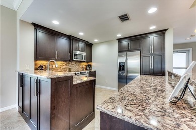 Well priced & move-in ready.  You'll enjoy watching golfers tee on Estero Country Club in Florida - for sale on GolfHomes.com, golf home, golf lot