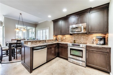 Well priced & move-in ready.  You'll enjoy watching golfers tee on Estero Country Club in Florida - for sale on GolfHomes.com, golf home, golf lot