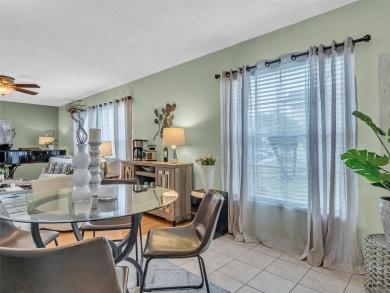 Rarely Available Ground-Floor Condo in Vibrant 55+ Green Dolphin on Tarpon Springs Golf Course in Florida - for sale on GolfHomes.com, golf home, golf lot