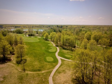 Luxury home site on the Chippewa River and Bucks Run Golf Course on Bucks Run Golf Club in Michigan - for sale on GolfHomes.com, golf home, golf lot