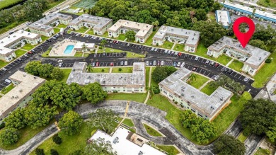 Rarely Available Ground-Floor Condo in Vibrant 55+ Green Dolphin on Tarpon Springs Golf Course in Florida - for sale on GolfHomes.com, golf home, golf lot