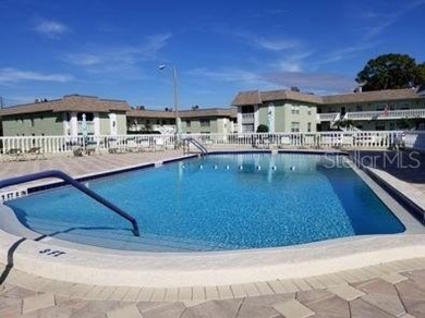 Rarely Available Ground-Floor Condo in Vibrant 55+ Green Dolphin on Tarpon Springs Golf Course in Florida - for sale on GolfHomes.com, golf home, golf lot