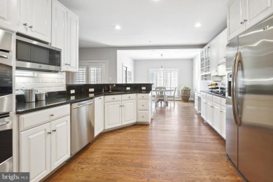 Welcome home! This luxurious Natelli-built  townhome in the on TPC Potomac At Avenel in Maryland - for sale on GolfHomes.com, golf home, golf lot