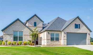 Discover this beautifully upgraded Larkspur model--better than on Wildhorse Golf Club of Robson Ranch in Texas - for sale on GolfHomes.com, golf home, golf lot