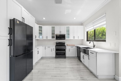 Stunning recently renovated 4 BR home, nestled within the highly on Bear Lakes Country Club in Florida - for sale on GolfHomes.com, golf home, golf lot
