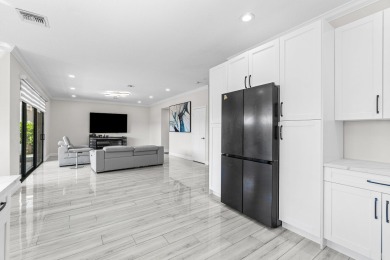 Stunning recently renovated 4 BR home, nestled within the highly on Bear Lakes Country Club in Florida - for sale on GolfHomes.com, golf home, golf lot