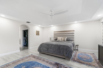 Stunning recently renovated 4 BR home, nestled within the highly on Bear Lakes Country Club in Florida - for sale on GolfHomes.com, golf home, golf lot