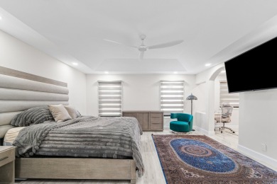 Stunning recently renovated 4 BR home, nestled within the highly on Bear Lakes Country Club in Florida - for sale on GolfHomes.com, golf home, golf lot