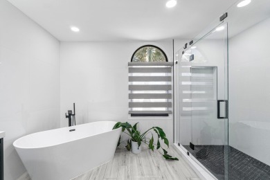 Stunning recently renovated 4 BR home, nestled within the highly on Bear Lakes Country Club in Florida - for sale on GolfHomes.com, golf home, golf lot