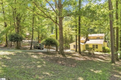 Welcome to 303 Manitowoc Drive, tucked within the highly on The Trail At Chickasaw Pointe in South Carolina - for sale on GolfHomes.com, golf home, golf lot