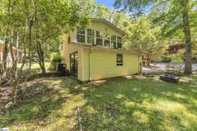 Welcome to 303 Manitowoc Drive, tucked within the highly on The Trail At Chickasaw Pointe in South Carolina - for sale on GolfHomes.com, golf home, golf lot
