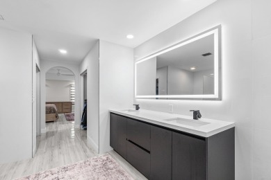 Stunning recently renovated 4 BR home, nestled within the highly on Bear Lakes Country Club in Florida - for sale on GolfHomes.com, golf home, golf lot