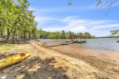 Welcome to 303 Manitowoc Drive, tucked within the highly on The Trail At Chickasaw Pointe in South Carolina - for sale on GolfHomes.com, golf home, golf lot