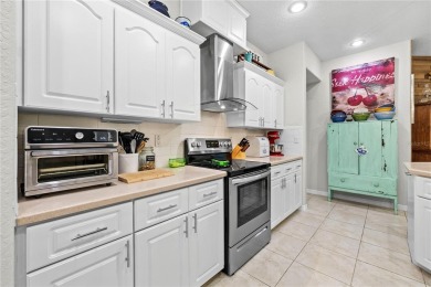 So Many UPGRADES in This stunning Alexander Custom built on Oak Hills Country Club in Florida - for sale on GolfHomes.com, golf home, golf lot