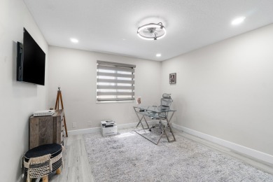 Stunning recently renovated 4 BR home, nestled within the highly on Bear Lakes Country Club in Florida - for sale on GolfHomes.com, golf home, golf lot