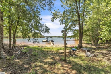 Welcome to 303 Manitowoc Drive, tucked within the highly on The Trail At Chickasaw Pointe in South Carolina - for sale on GolfHomes.com, golf home, golf lot