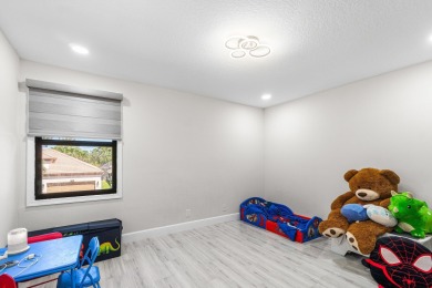 Stunning recently renovated 4 BR home, nestled within the highly on Bear Lakes Country Club in Florida - for sale on GolfHomes.com, golf home, golf lot