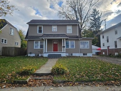 Spacious newly renovated home that is conveniently located to on Flint Golf Club in Michigan - for sale on GolfHomes.com, golf home, golf lot