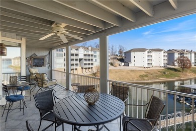 Experience lakefront living at 488 Regatta Bay Circle #2C, where on Seasons Ridge At Four Seasons in Missouri - for sale on GolfHomes.com, golf home, golf lot