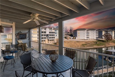 Experience lakefront living at 488 Regatta Bay Circle #2C, where on Seasons Ridge At Four Seasons in Missouri - for sale on GolfHomes.com, golf home, golf lot