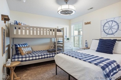 Experience lakefront living at 488 Regatta Bay Circle #2C, where on Seasons Ridge At Four Seasons in Missouri - for sale on GolfHomes.com, golf home, golf lot