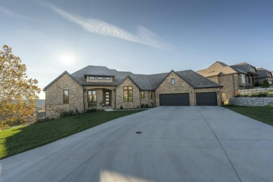 Stunning all-brick and stone walkout basement home located in on Rivercut Golf Course in Missouri - for sale on GolfHomes.com, golf home, golf lot