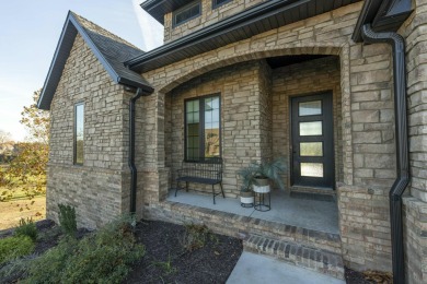 Stunning all-brick and stone walkout basement home located in on Rivercut Golf Course in Missouri - for sale on GolfHomes.com, golf home, golf lot